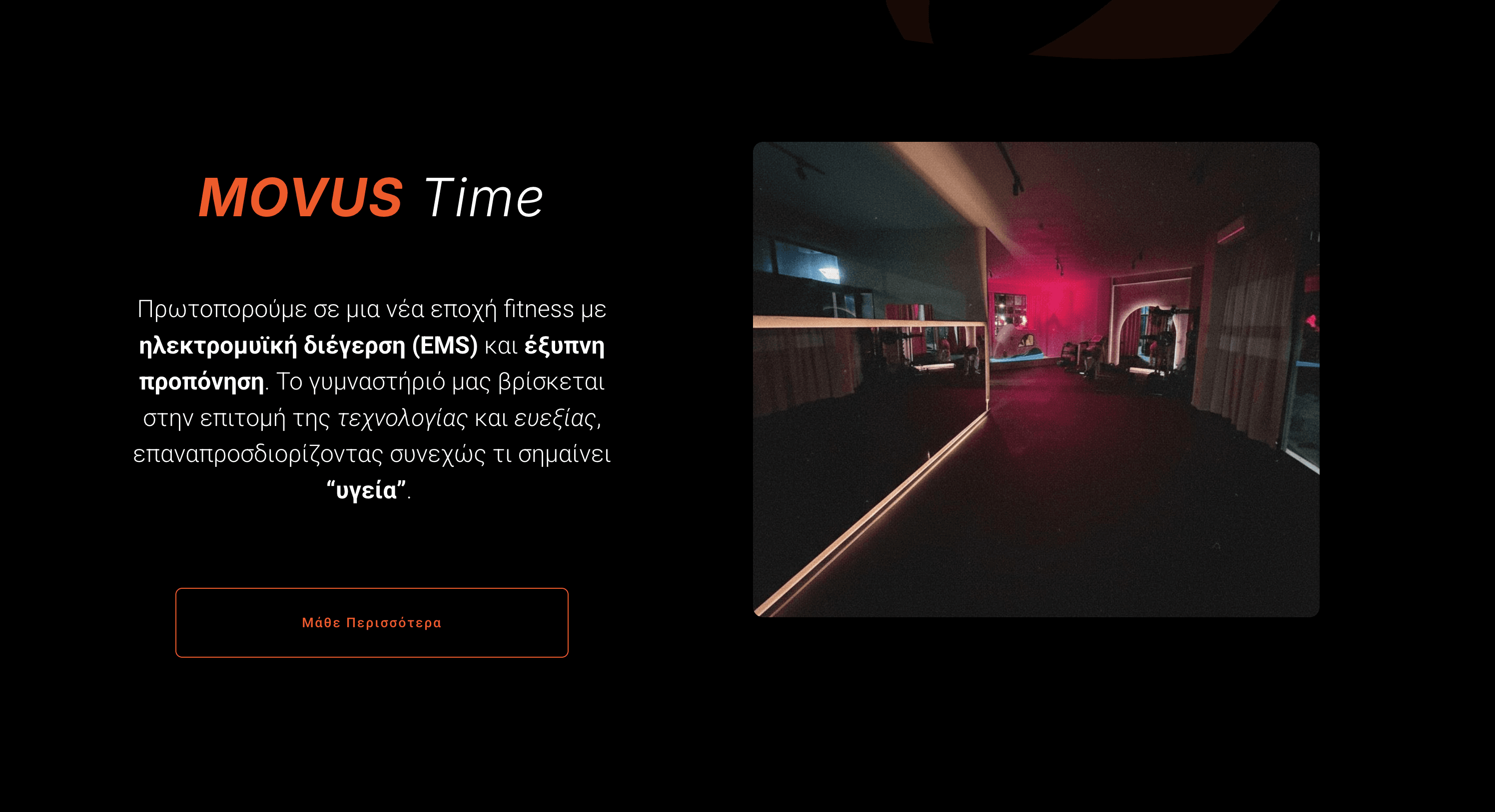 MOVUS Time — EMS training with pink-lit gym interior